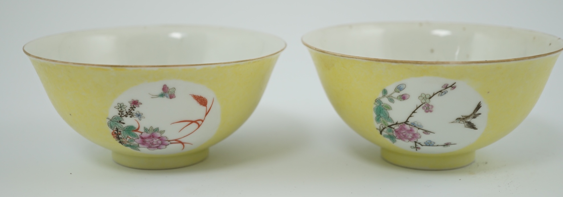 A pair of Chinese yellow sgraffito ground medallion bowls, Guangxu mark, early 20th century